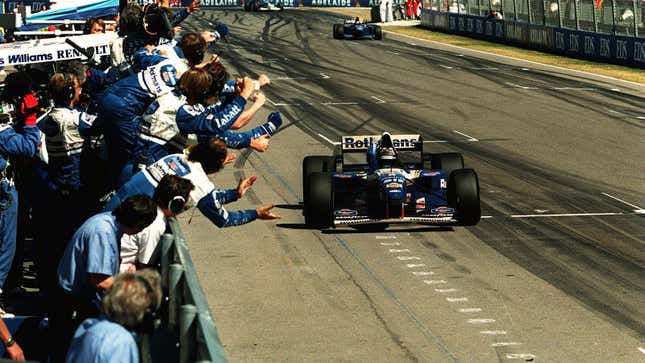 A photo of Damon Hill winning an F1 race. 